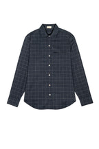 Navy checkered shirt on a white background