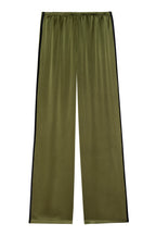 Green satin pants on a white background